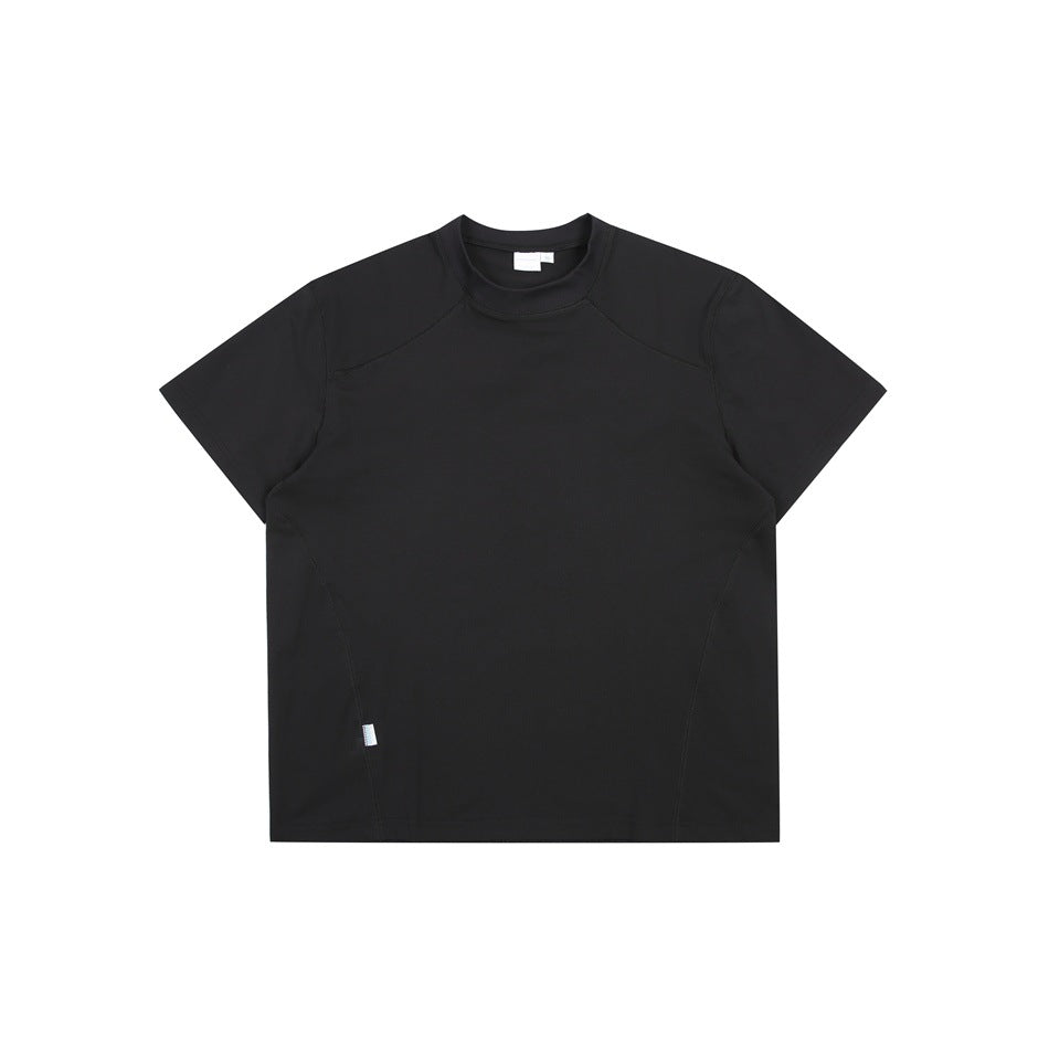 Black short-sleeve crew-neck T-shirt flat lay with raglan-style shoulder seams and small side label