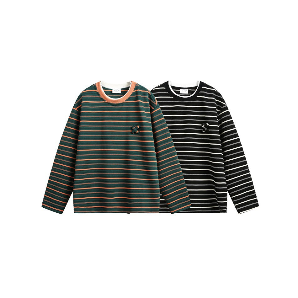 Two long-sleeve striped shirts shown flat: dark green with orange stripes and black with cream stripes.