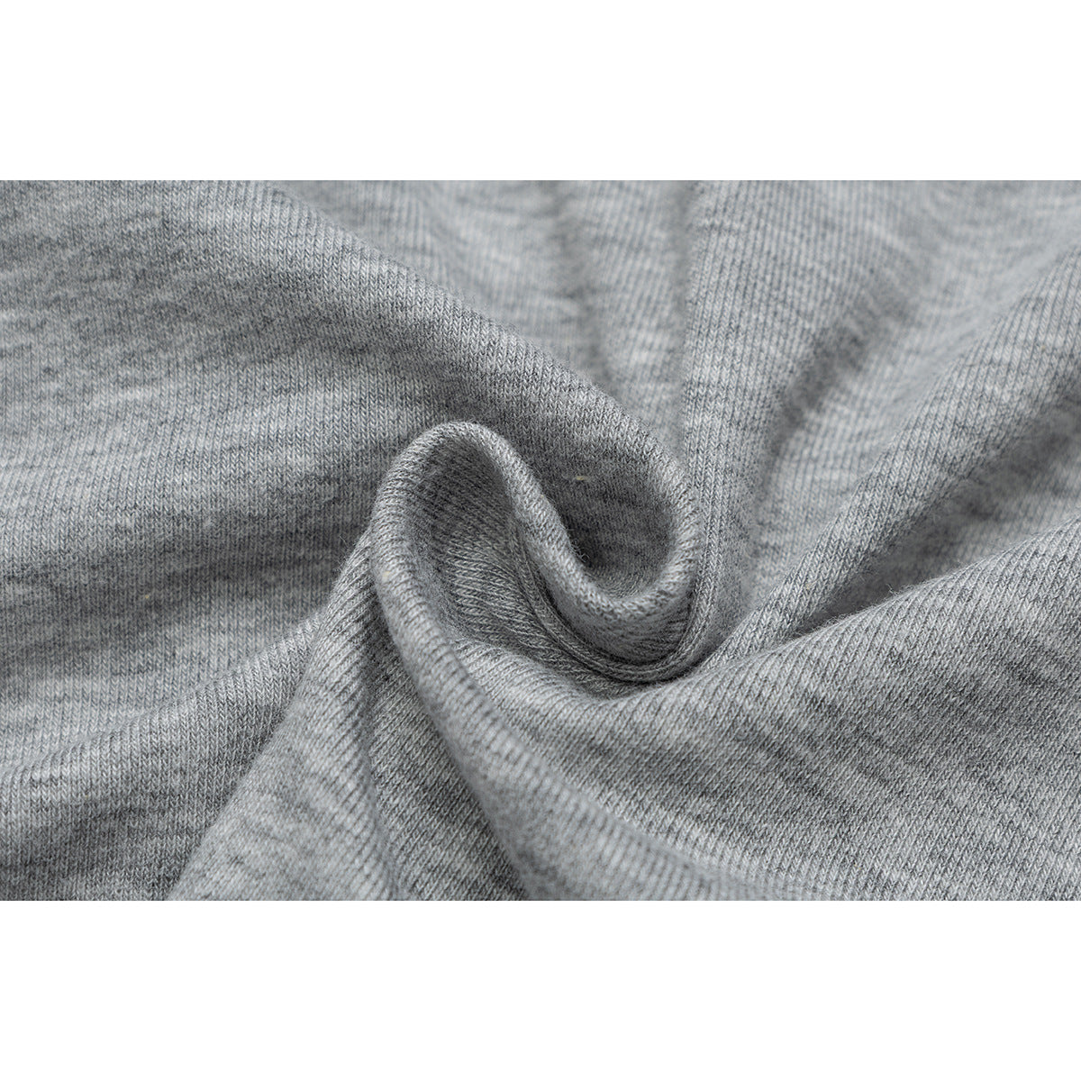 Close-up of heather-gray knit fabric gathered to show its surface and texture.