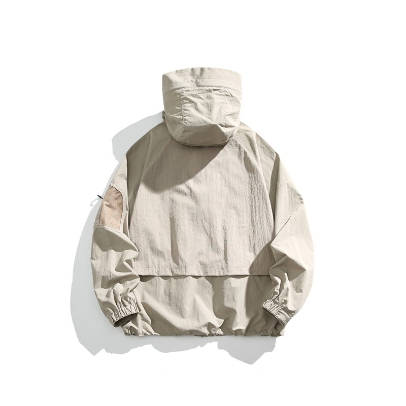 Light beige hooded pullover jacket shown from the back, with elastic cuffs and hem.