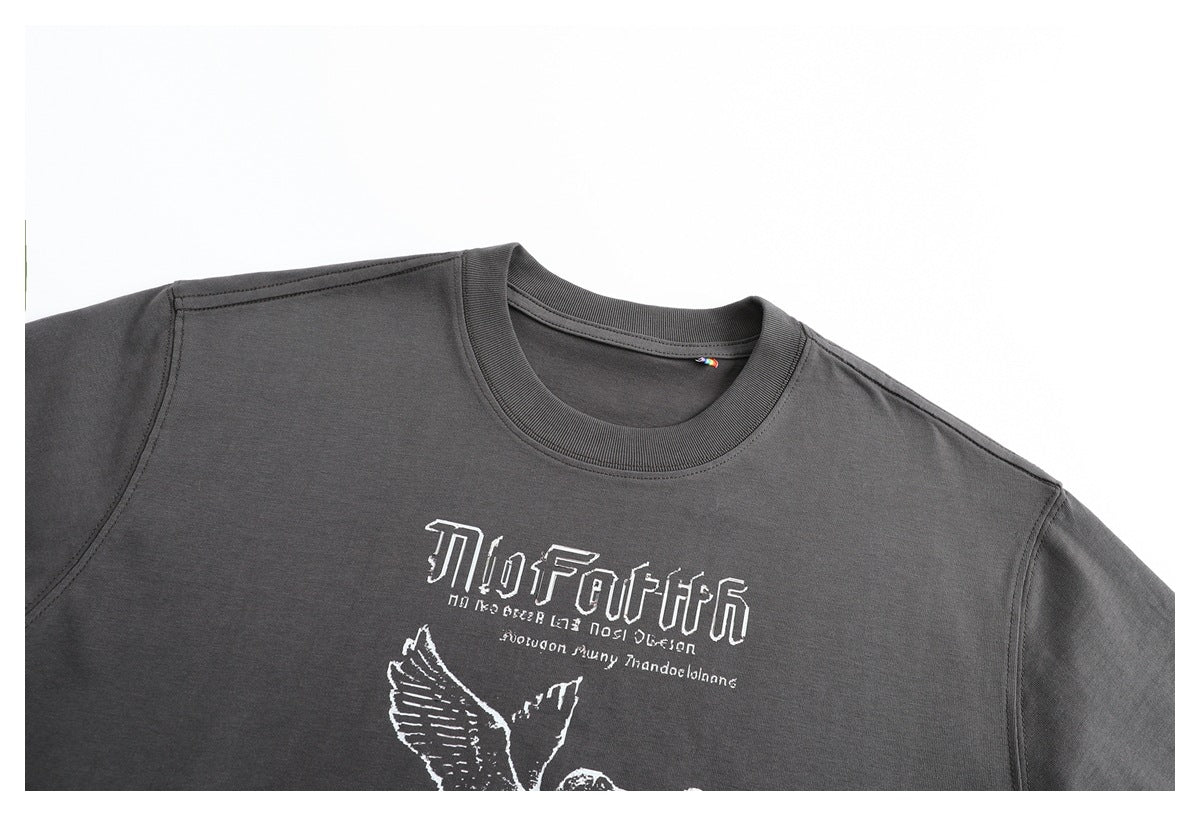 Cropped front view of a charcoal gray crew-neck T-shirt with a white chest graphic.