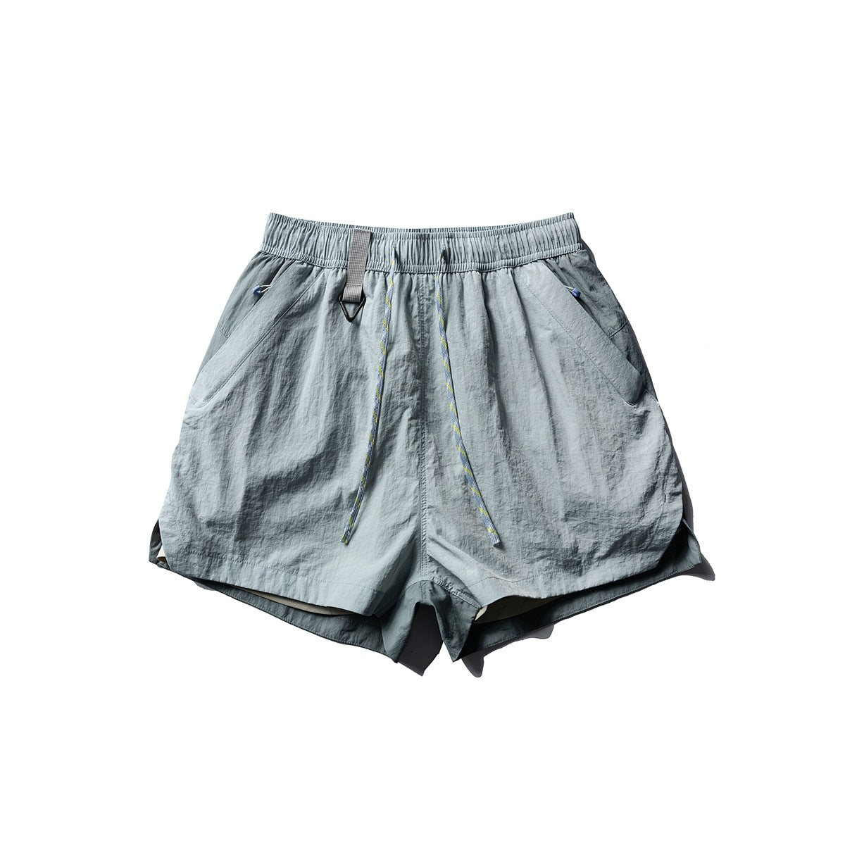 Flat-lay front of gray-green shorts with drawstring, ring loop, side pockets and curved split hems