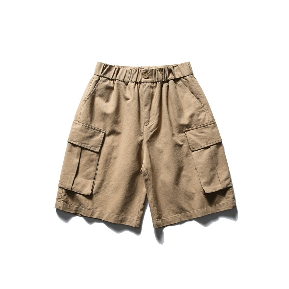 Khaki knee-length cargo shorts, front flat lay, elastic waist, front button, large flap pockets on both legs