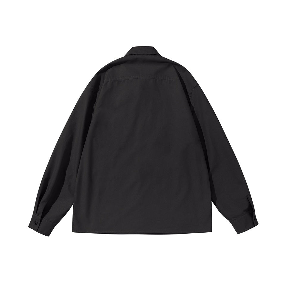 Back view of black long-sleeve shirt showing back yoke seam and buttoned cuffs, flat lay
