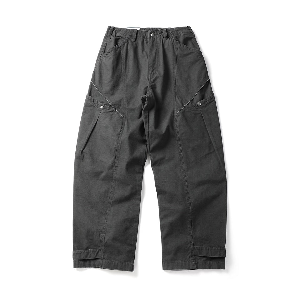 Dark charcoal-gray wide-leg utility pants flat lay, front view, with snap side pockets and hem tabs