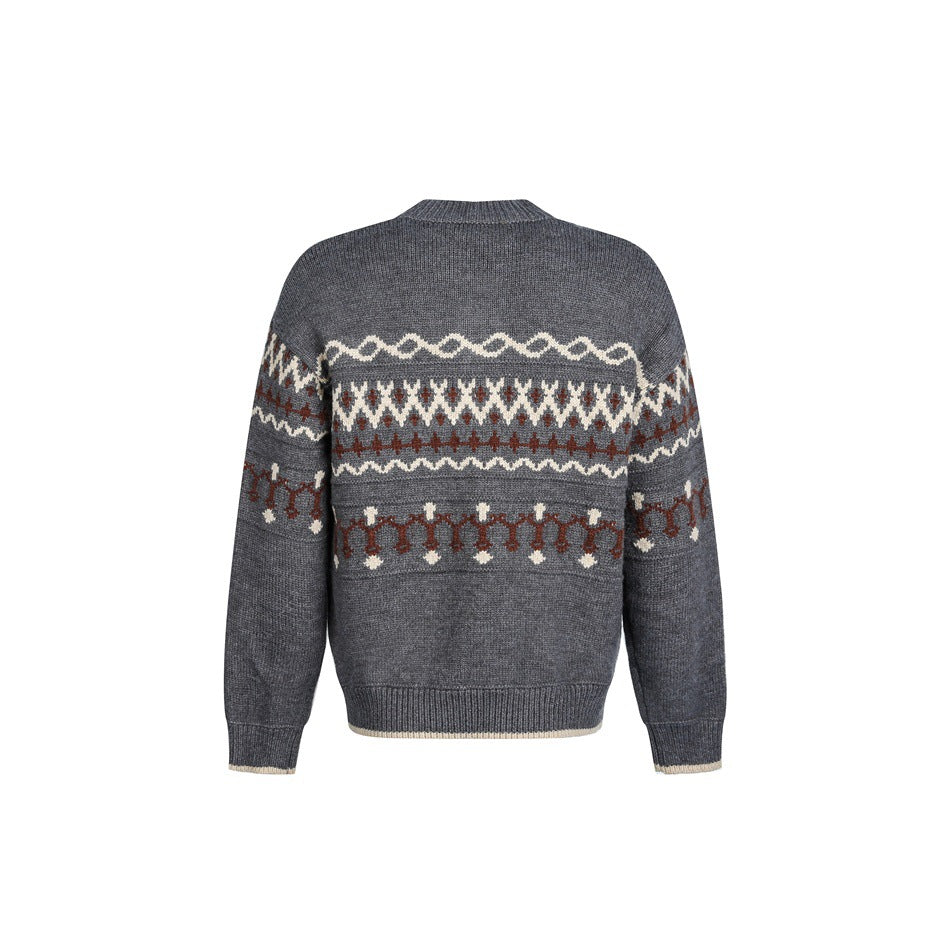 Back view of gray knit sweater with cream and rust-red geometric jacquard bands and ribbed hem