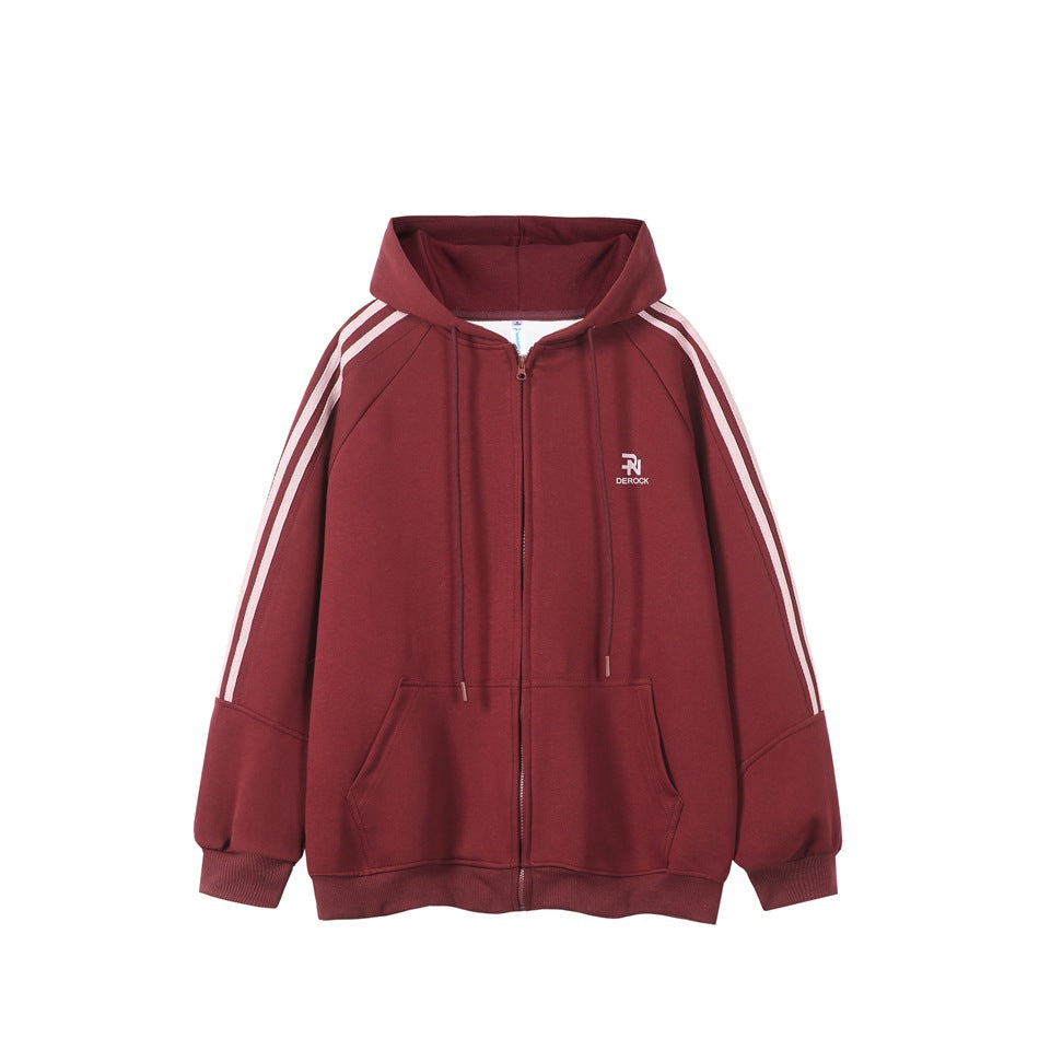 Front view of a burgundy zip-up hoodie with a hood, kangaroo pockets, drawstrings, pale sleeve stripes and a small chest