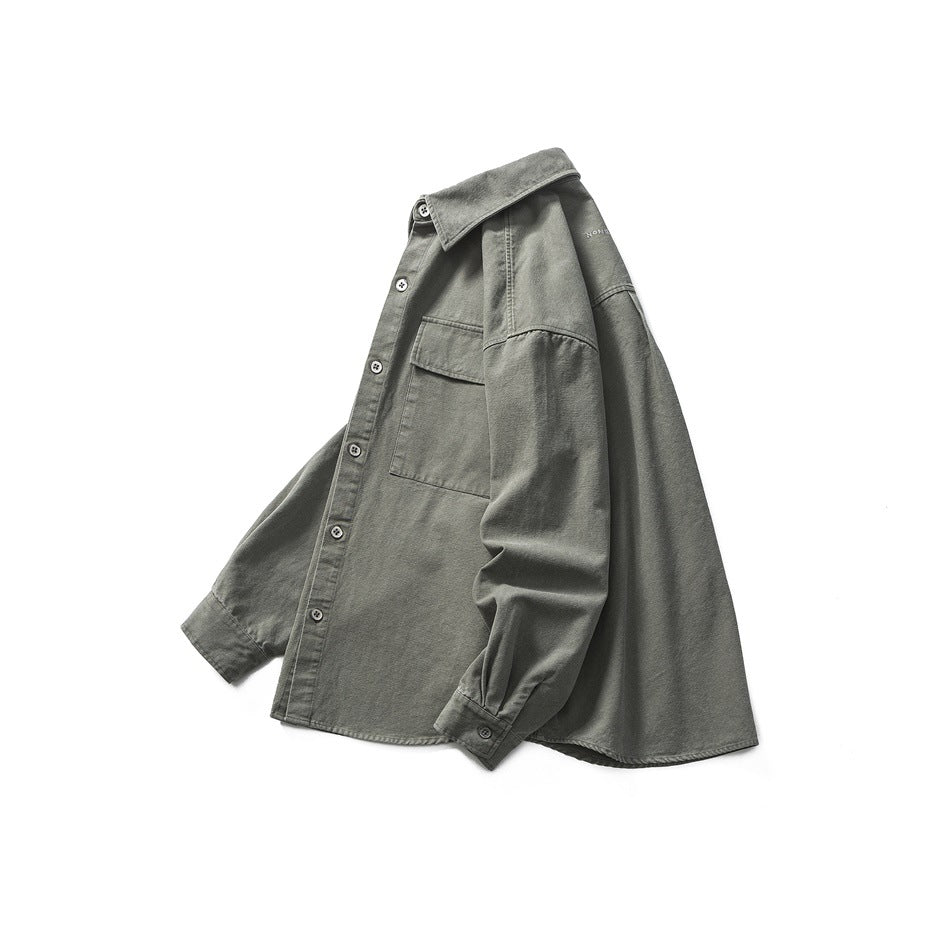 Charcoal gray long-sleeve button-up shirt with a pointed collar, chest pocket, and button cuffs, shown against white.