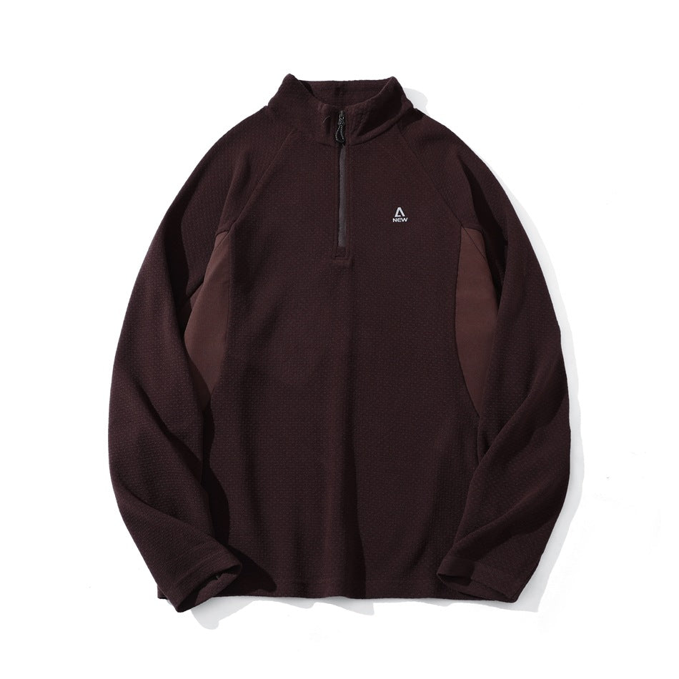 Dark coffee-red half-zip stand-collar pullover with textured knit, raglan sleeves and contrast side panels, flat lay