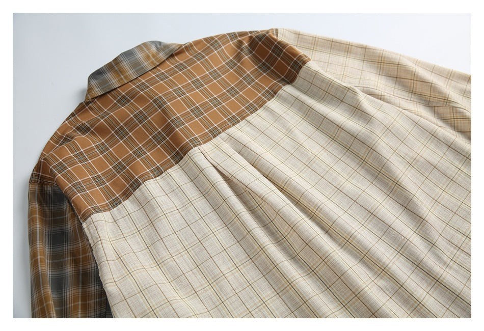 Flat-lay view of the shirt back, with a brown plaid yoke and cream plaid body and sleeves.