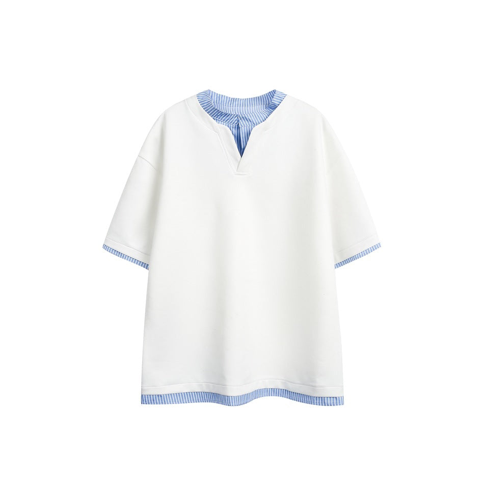 White short-sleeve tee with notched V-neck and blue striped layered trim at neck, sleeves and hem