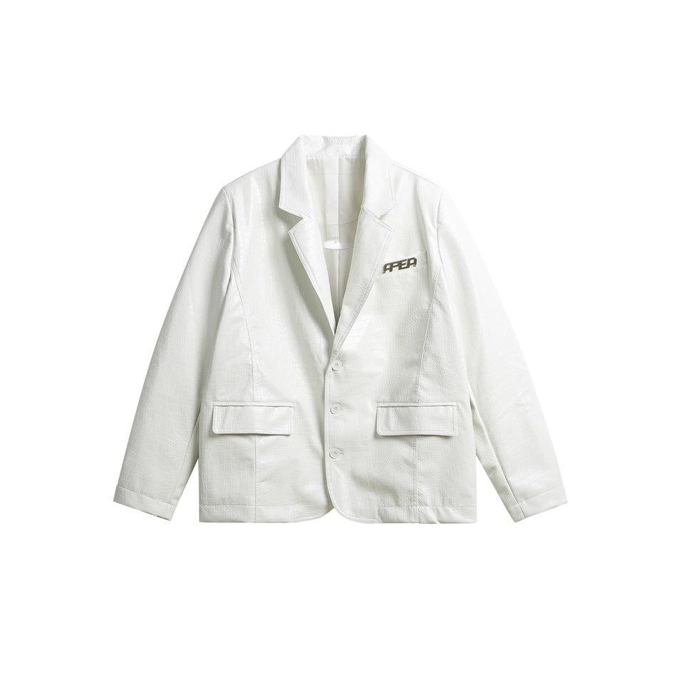 White blazer shown from the front, with notched lapels, three buttons, two flap pockets, and a small chest mark.