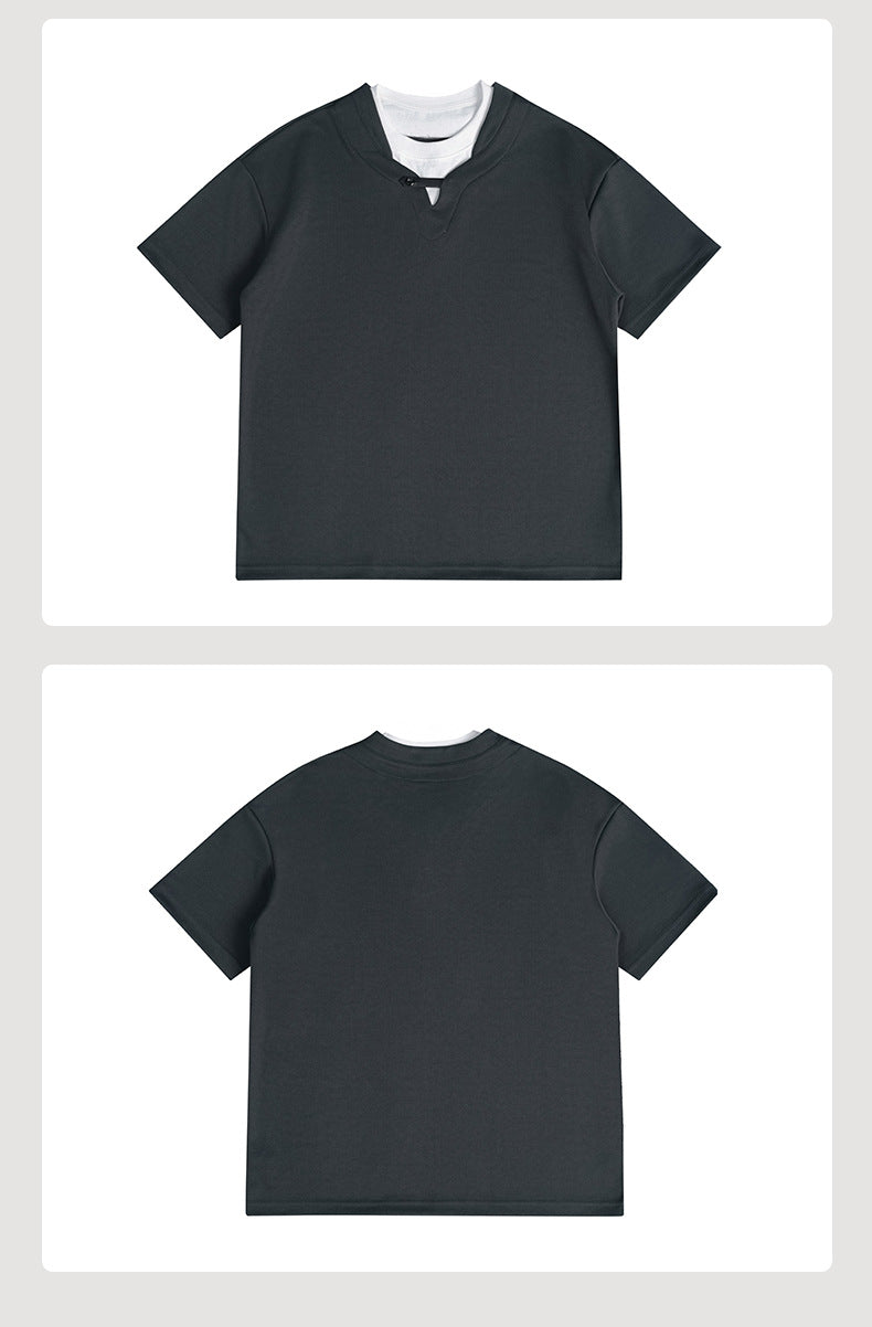 Front and back views of a dark charcoal short-sleeved V-neck shirt layered over a white crewneck.