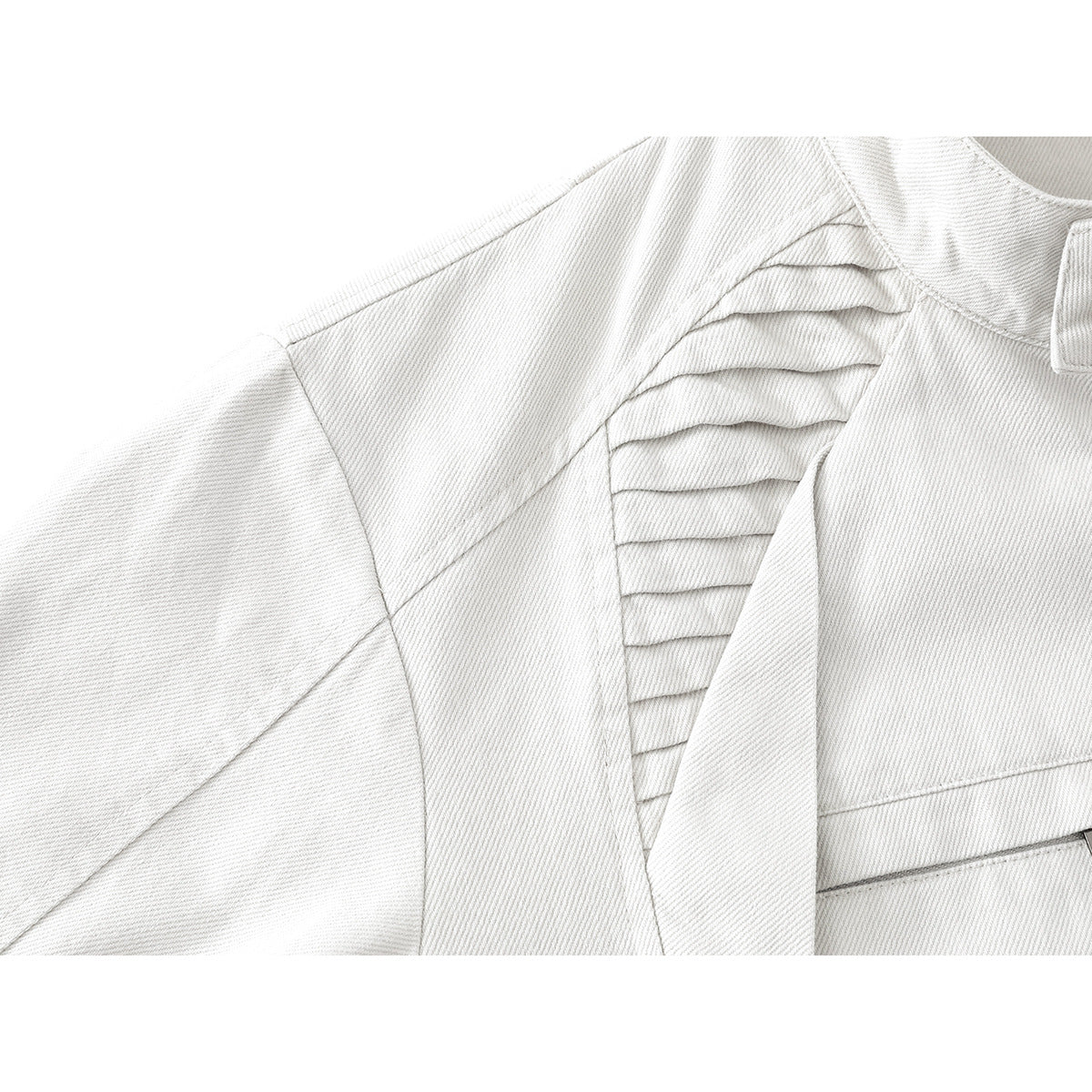 Close-up of an off-white jacket sleeve and shoulder, showing layered pleated panels and seams.