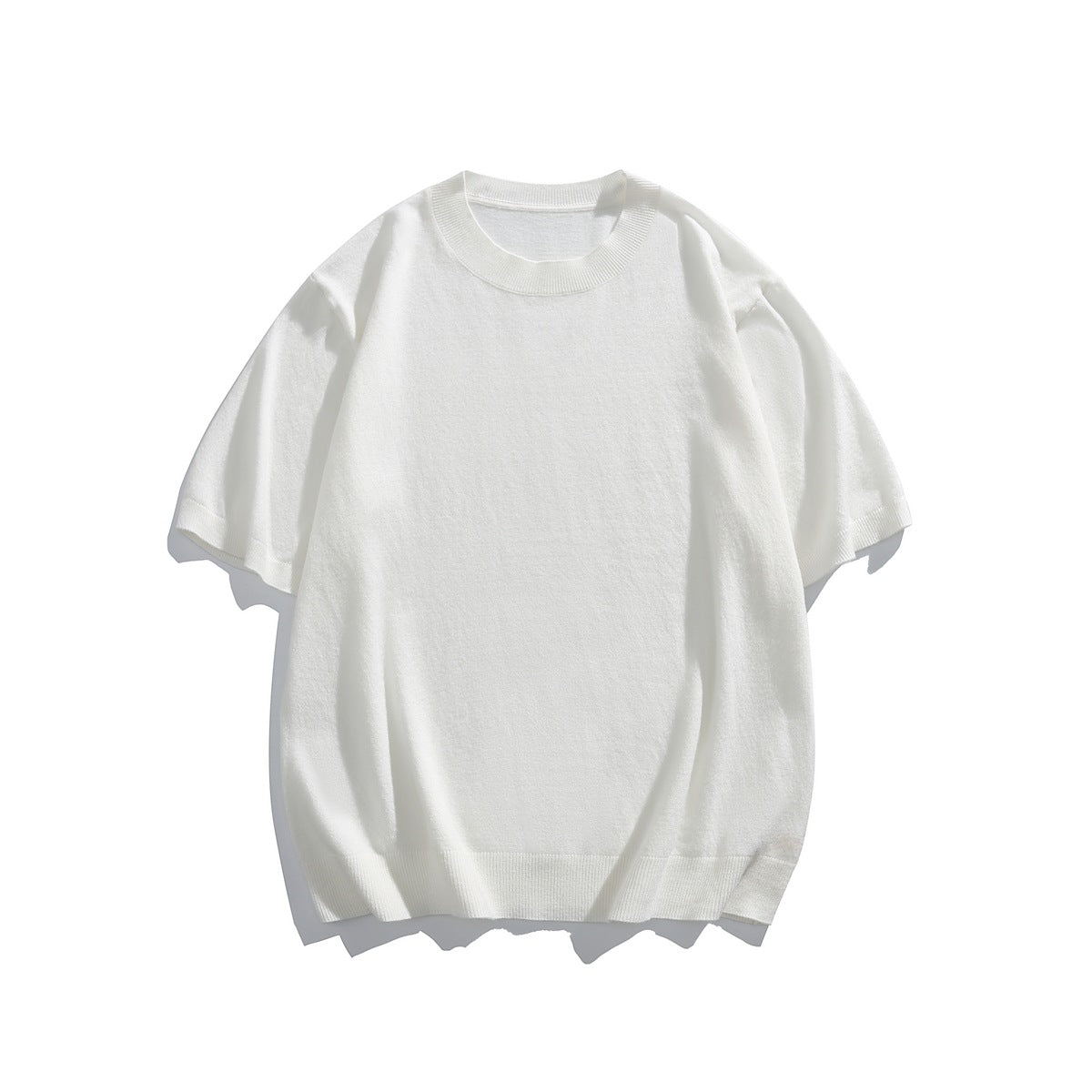 White short-sleeve knit crew-neck top flat lay, front view, with ribbed collar and hem