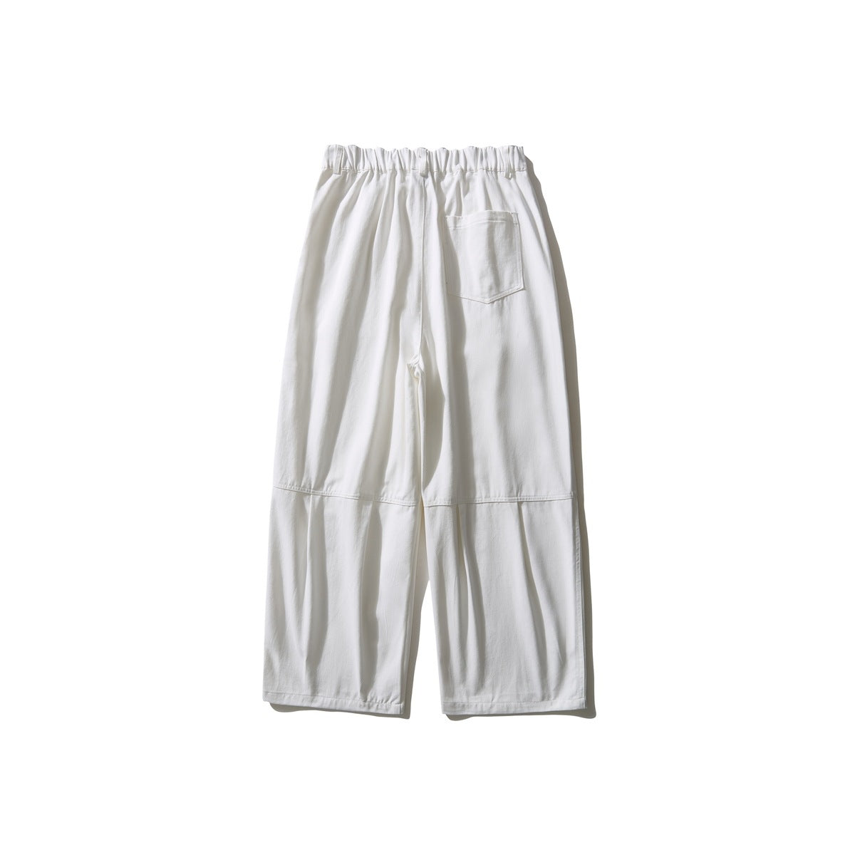 Back view of white wide-leg trousers with an elasticated waist, one patch pocket and seamed lower legs.