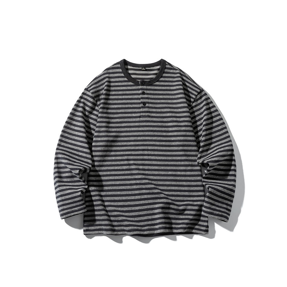 Black and light gray striped long-sleeve henley-style top with three buttons, shown flat from the front