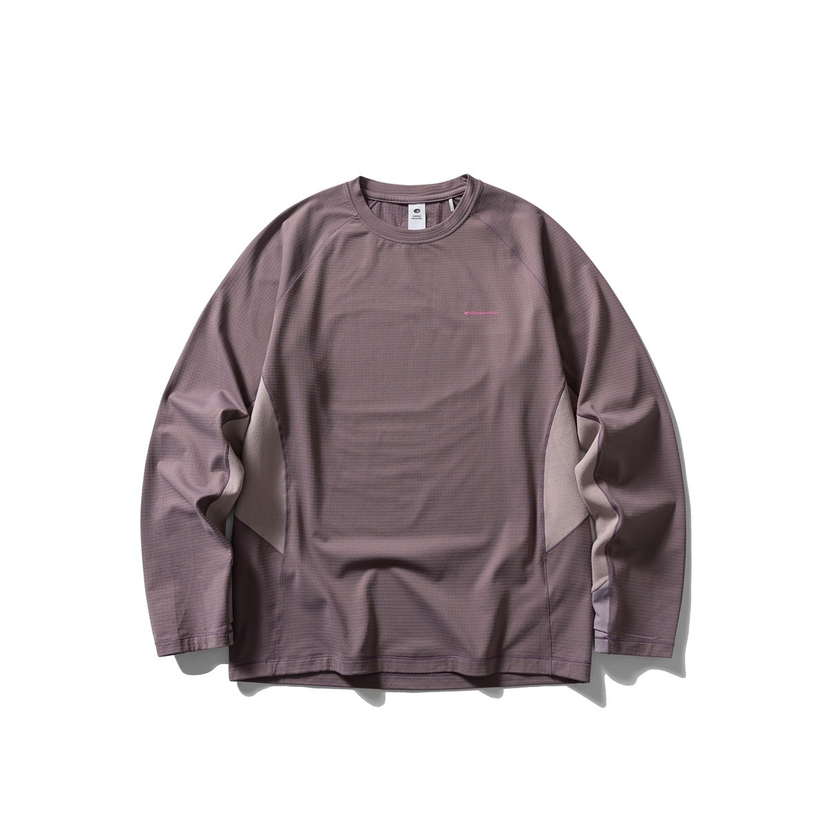 Dusty mauve long-sleeve crew-neck top with lighter pink-beige side panels and a small pink chest print, flat front view