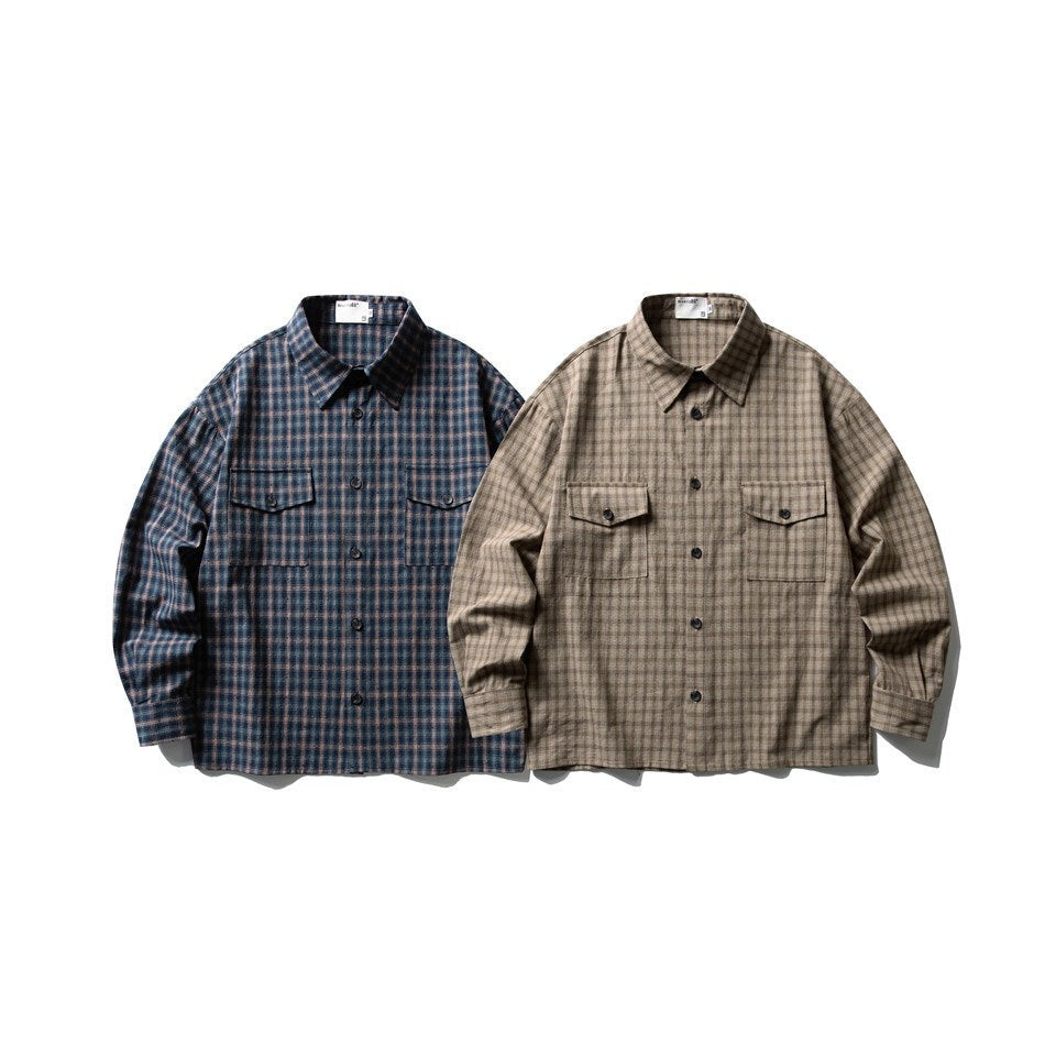 Two button-up plaid shirts shown from the front: one blue and brown, the other beige and brown.