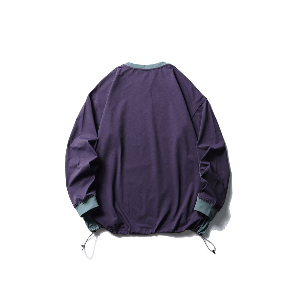 Back view of a dark purple long-sleeve sweatshirt with muted teal neck and cuffs and adjustable hem drawstrings.