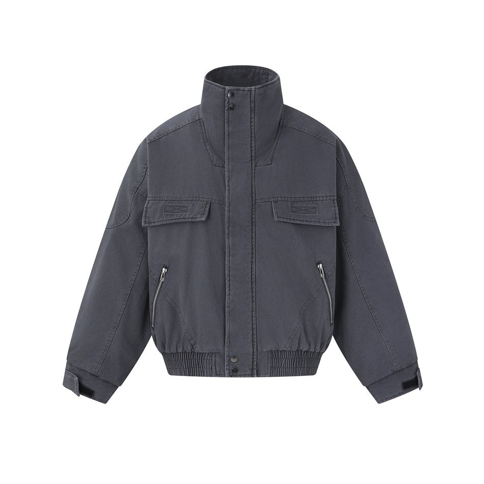 Gray stand-collar bomber jacket flat lay, front view with chest flap pockets and diagonal zip pockets