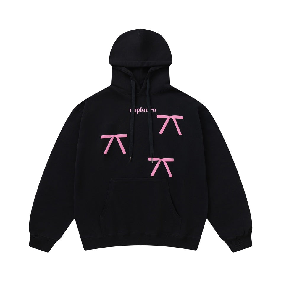 Black pullover hoodie with drawstring hood, kangaroo pocket and three pink bow graphics on the front