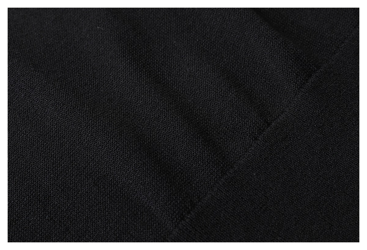 Extreme close-up of the fine knit texture of black fabric.