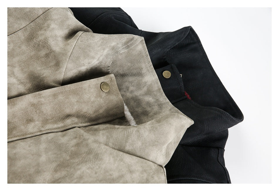 Close-up of overlapping taupe and black jackets showing collar and cuff details, with a glimpse of burgundy lining.