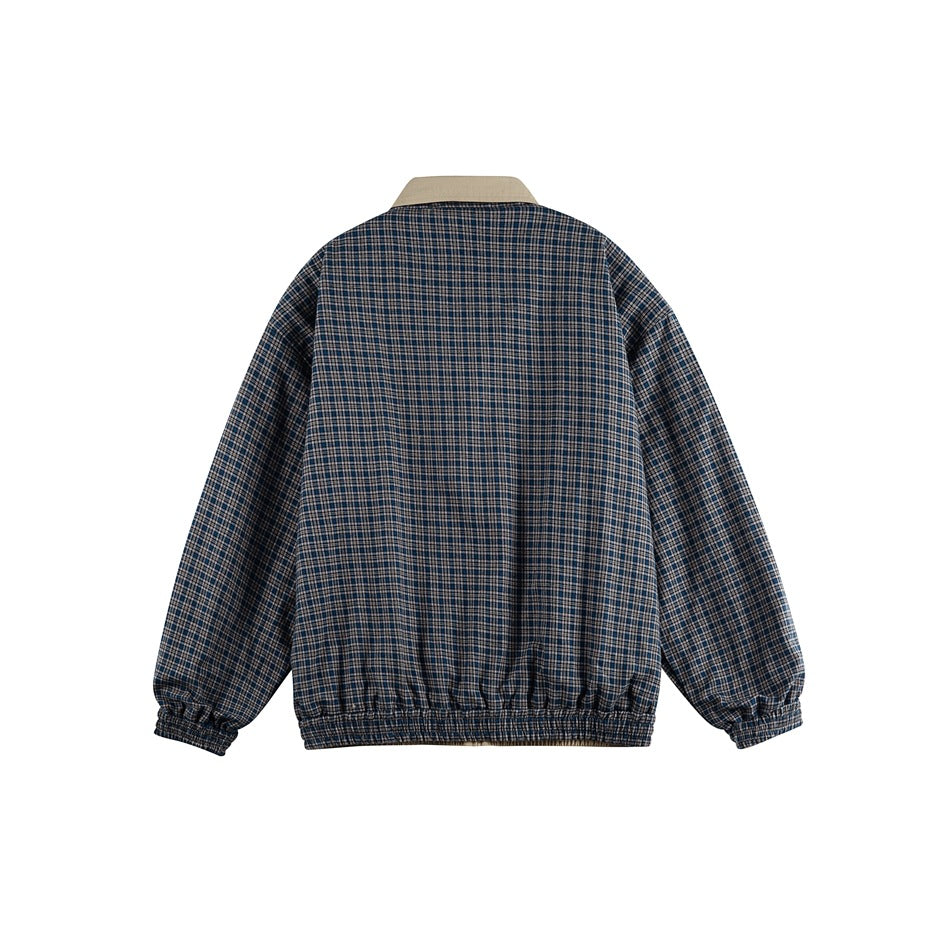 Back view of a navy, gray and tan plaid jacket with a beige collar and gathered elastic cuffs and hem.