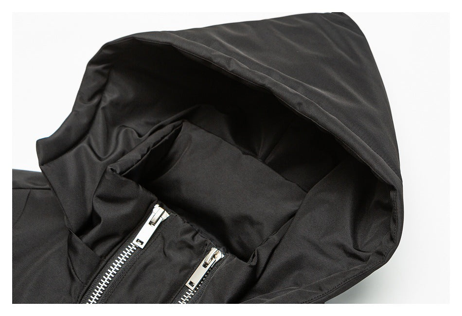 Close-up of the black jacket's open hood and inner lining.