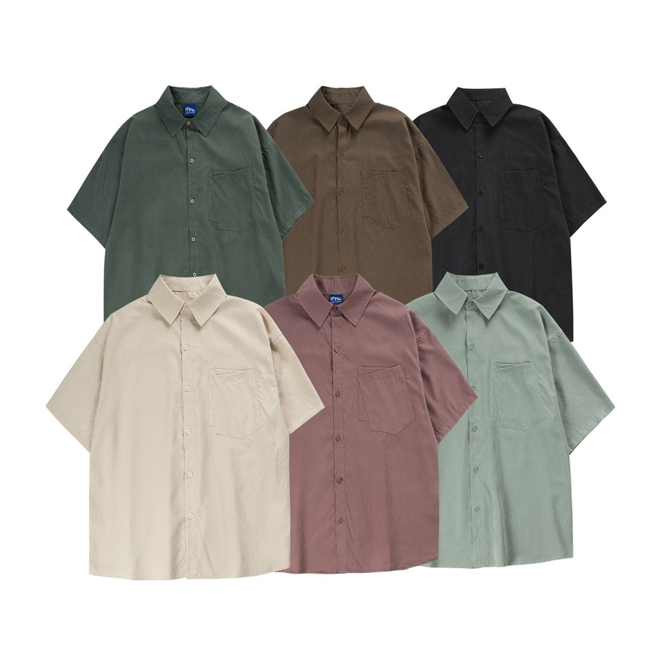 Six short-sleeve button-up shirts with chest pockets, shown in dark green, brown, black, cream, mauve, and sage.