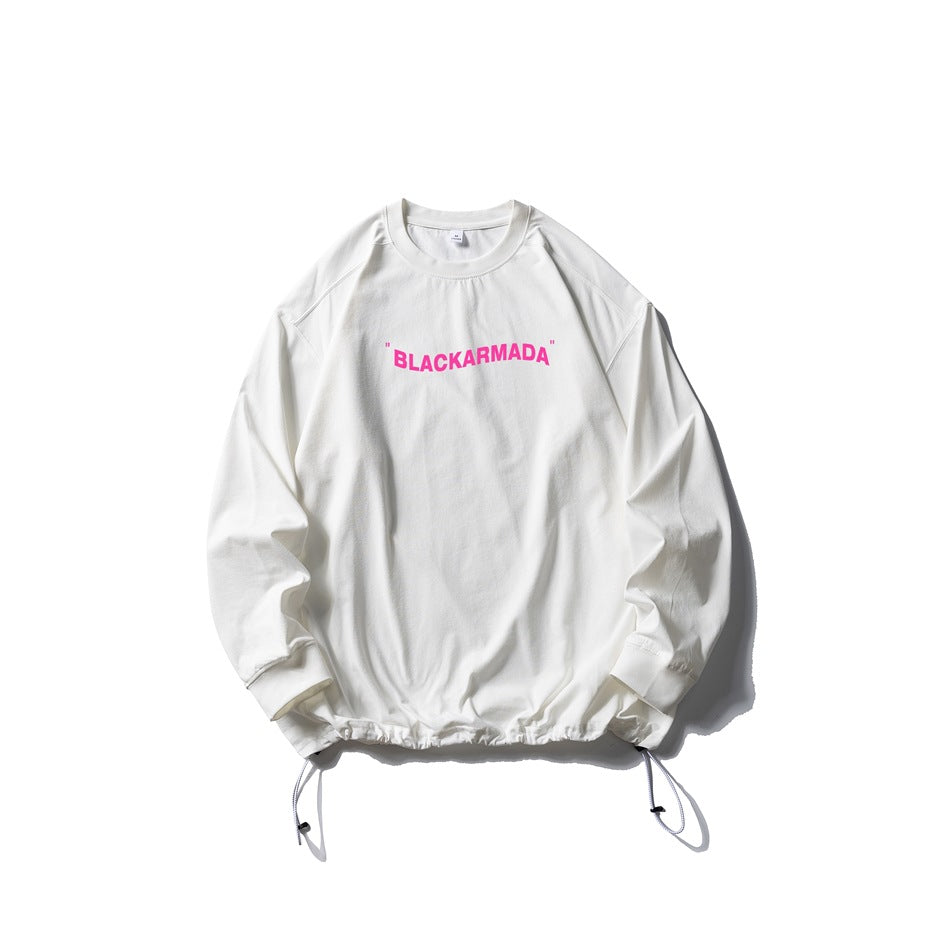 White long-sleeve crew-neck top with pink chest text print and drawstring hem, flat lay