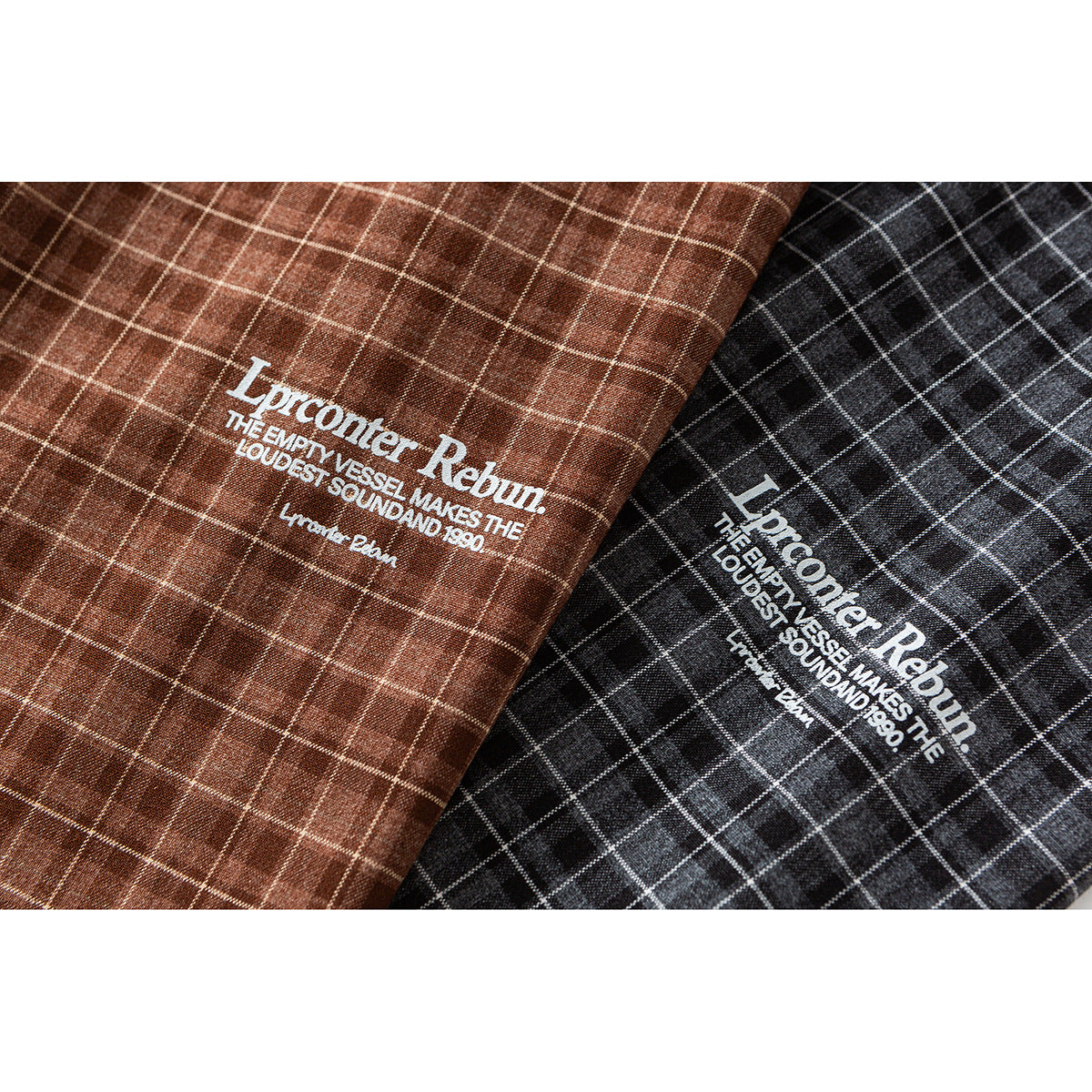 Brown and charcoal plaid shirt fabric with white English graphic text printed on both colorways.