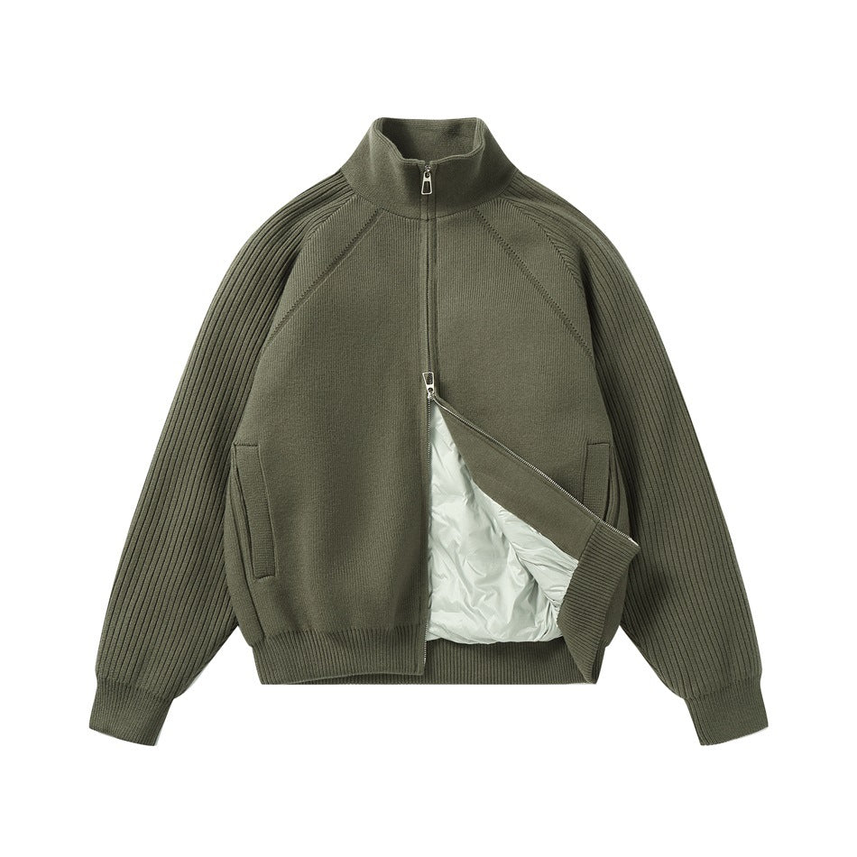 Army green knit stand-collar zip jacket partly unzipped, showing a light quilted inner layer and ribbed sleeves
