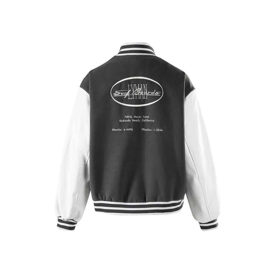 Back of gray varsity jacket with white sleeves and large embroidered oval graphic with text
