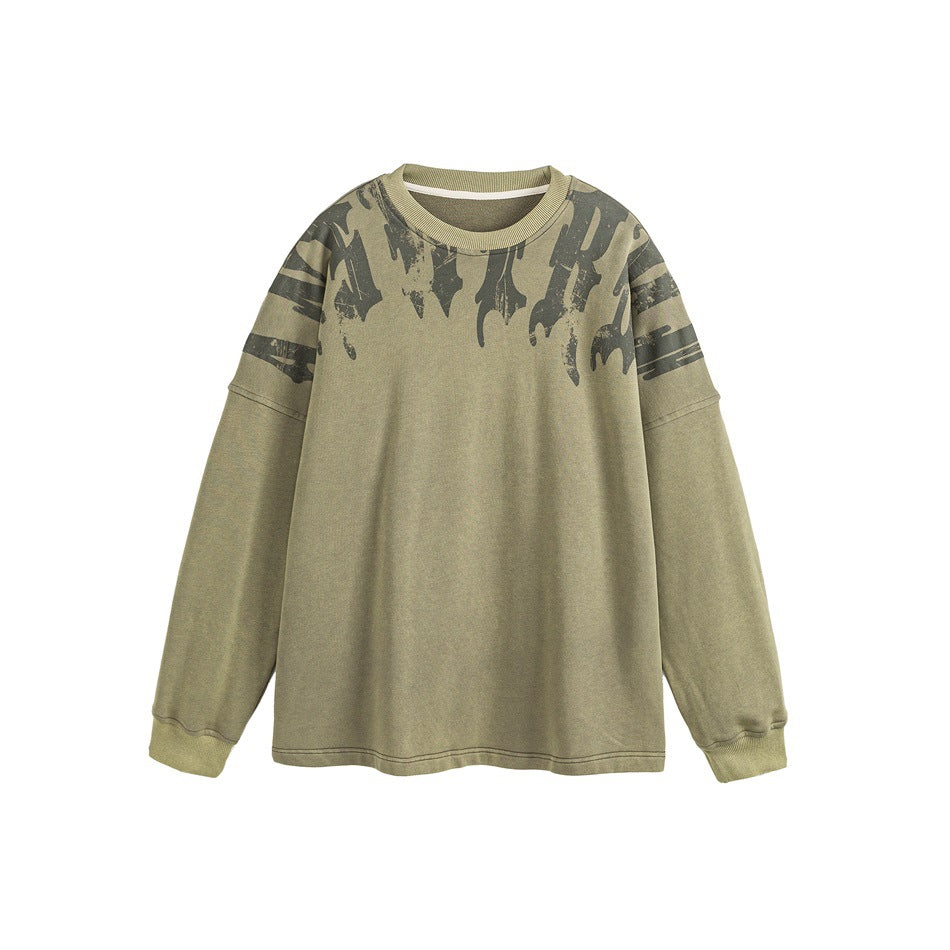 Olive green crew-neck sweatshirt flat lay with distressed dark green lettering print across the shoulders