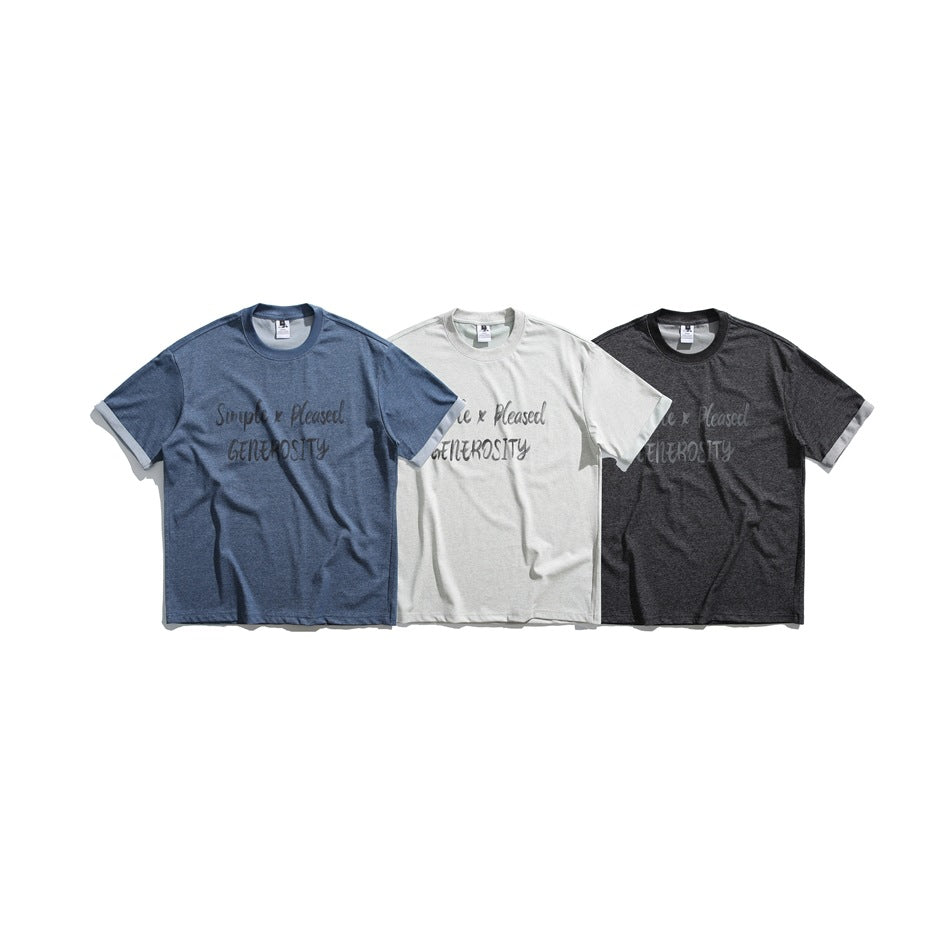 Three short-sleeve T-shirts shown from the front in blue, light gray, and charcoal, each with chest lettering.