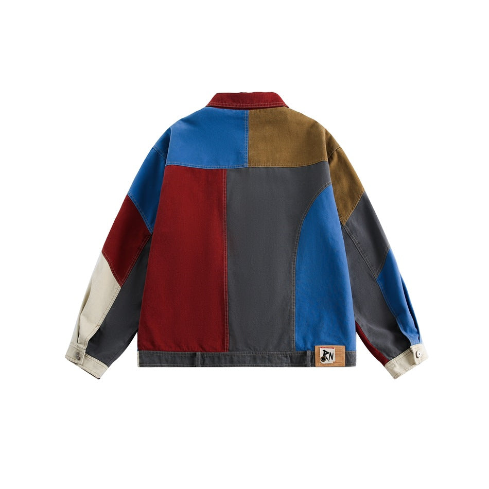 Back view of a color-block jacket with blue, burgundy, charcoal, tan, and cream panels.