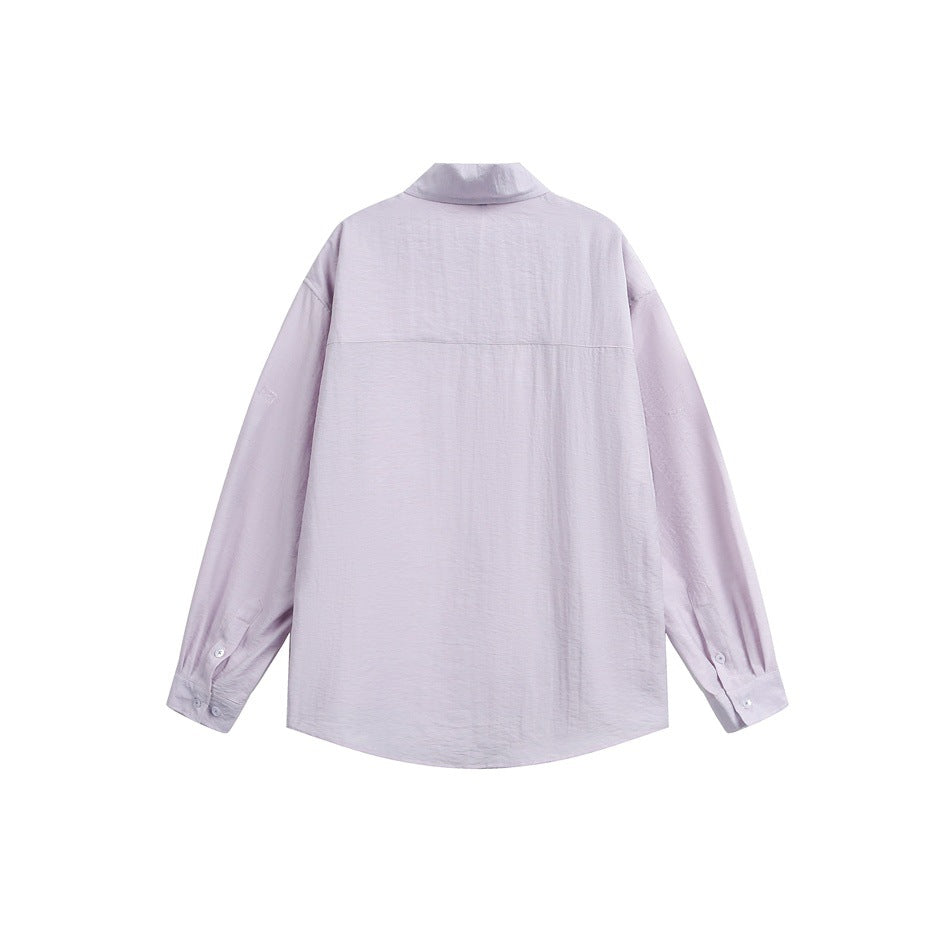 Back view of a pale lavender long-sleeve button-up shirt with a back yoke and button cuffs, shown flat.