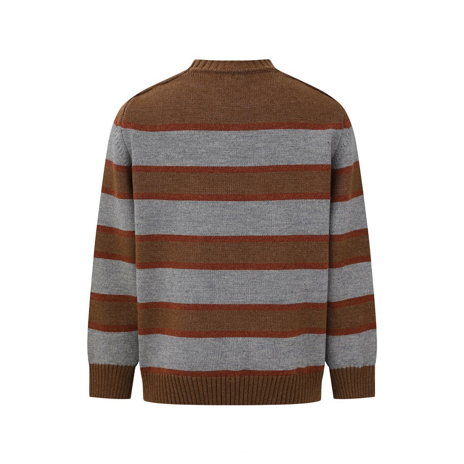 Back view of a brown crewneck sweater with horizontal gray and rust stripes and ribbed cuffs and hem.