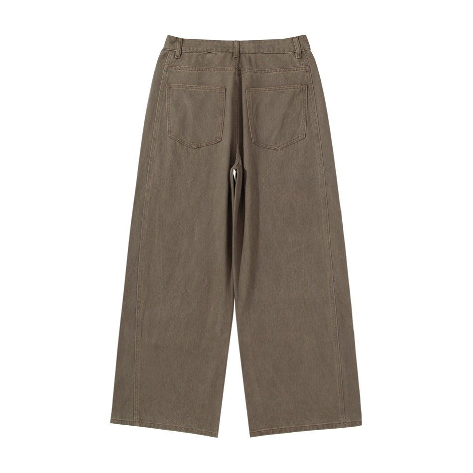 Back view of muted brown wide-leg pants with two rear patch pockets and belt loops.