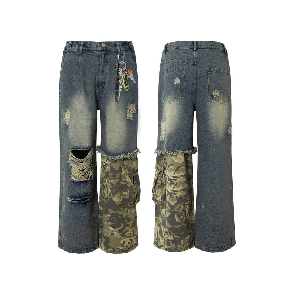 Front and back product views of oversized gray jeans with distressed details, frayed hems, and olive camouflage cargo panels.
