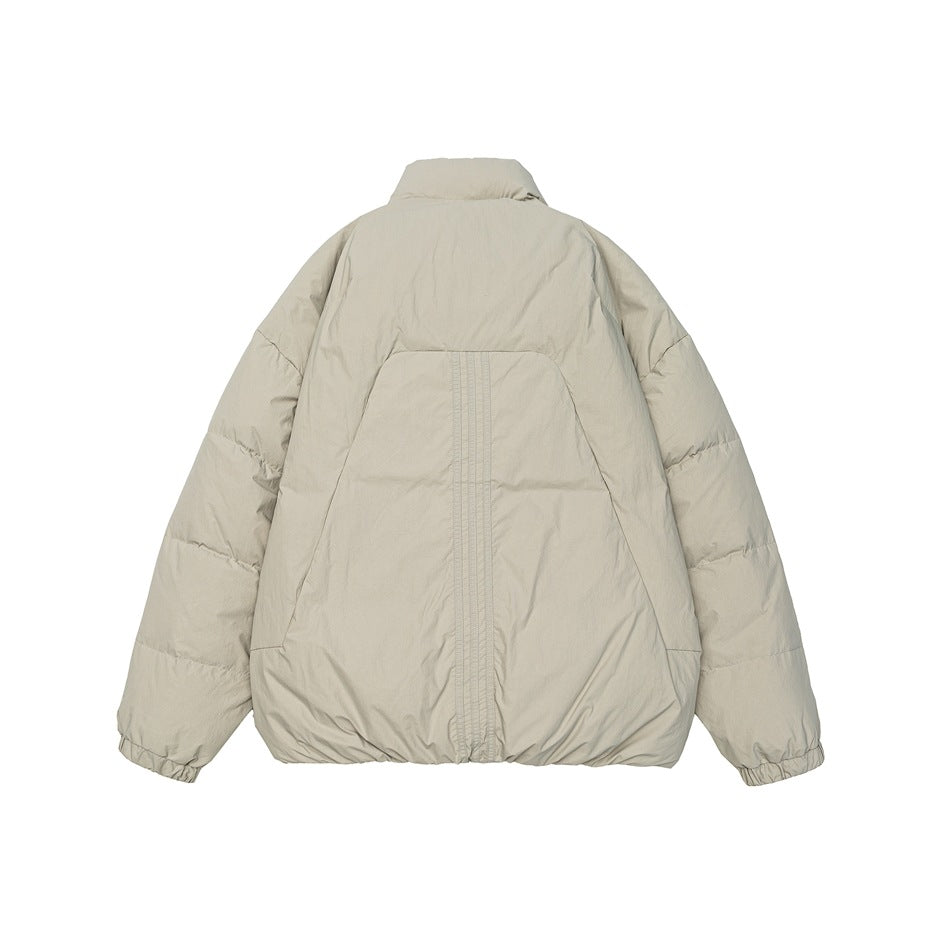 Back view of a light beige puffer jacket with a high collar and elastic cuffs.