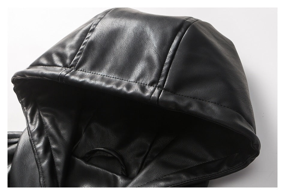 Close-up of the black glossy jacket's paneled hood and stitched seams.