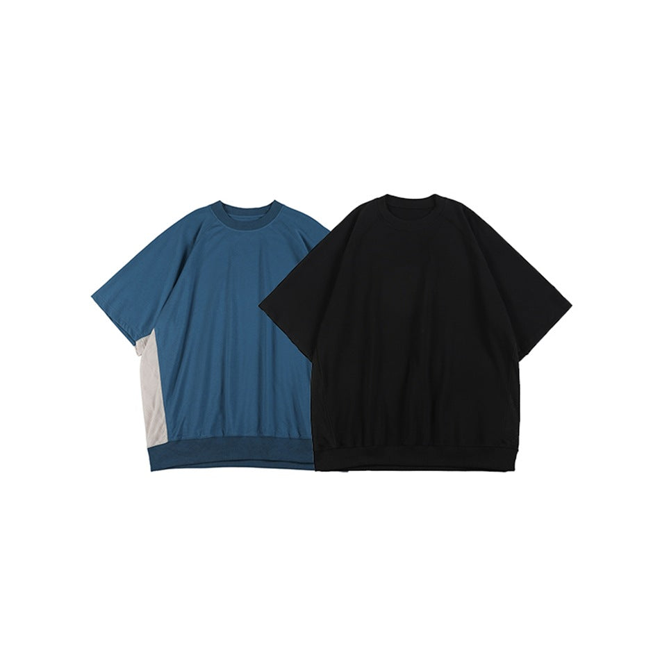 Blue and black short-sleeve crewneck tops shown together; the blue top has light side panels.