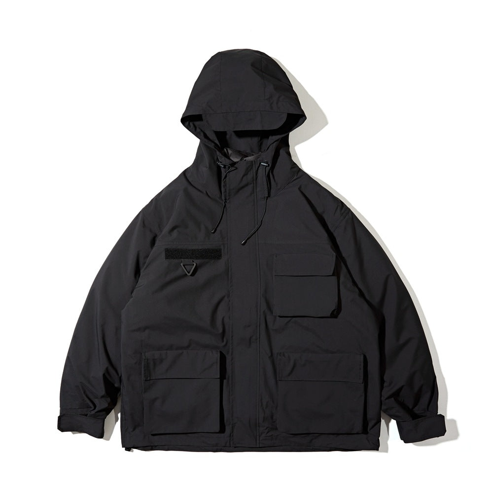 Front view of a black hooded jacket with a full-length zipper, drawcords, and multiple flap pockets.