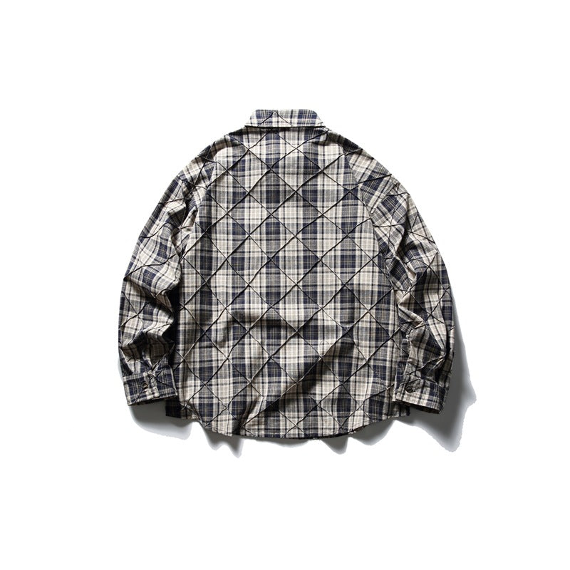 Back view of navy and cream plaid long-sleeve shirt with diamond stitched lines, laid flat