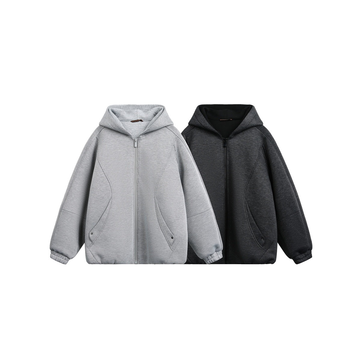 Light gray and charcoal hooded zip-up jackets shown side by side, each with curved front pockets.
