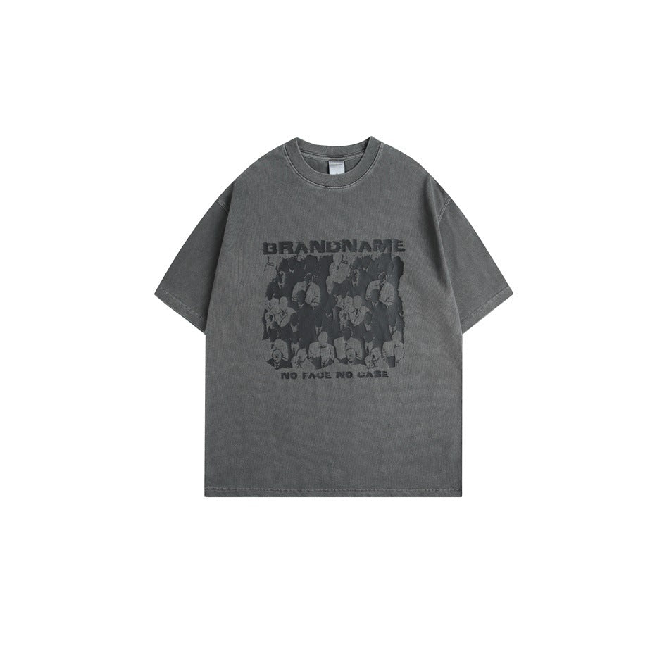 Washed charcoal black short-sleeve crew-neck t-shirt with a faceless-crowd graphic and BRANDNAME text, front view