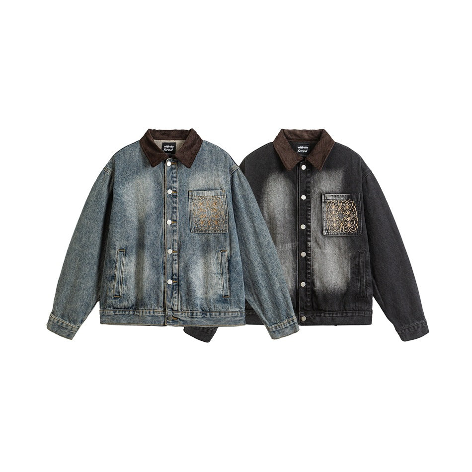 Front view of blue and black washed denim jackets with brown corduroy collars and gold floral embroidery on the chest